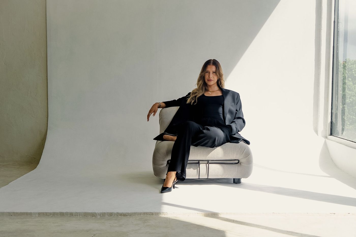 Liv Ball, Meta Ads consultant and founder of L Digital, seated in a sunlit studio