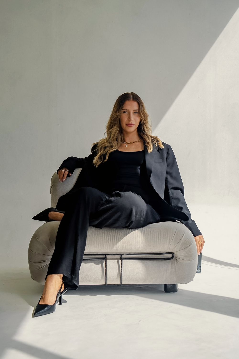 Liv Ball, Meta Ads consultant and founder of L Digital, seated in a sunlit studio
